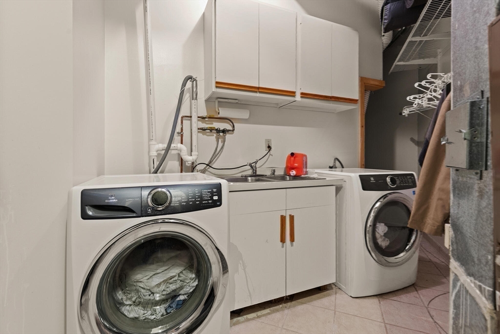 15 Flume Road, Unit 4 Gloucester, MA 01930 - Photo 37 of 41 a utility room with dryer and washer