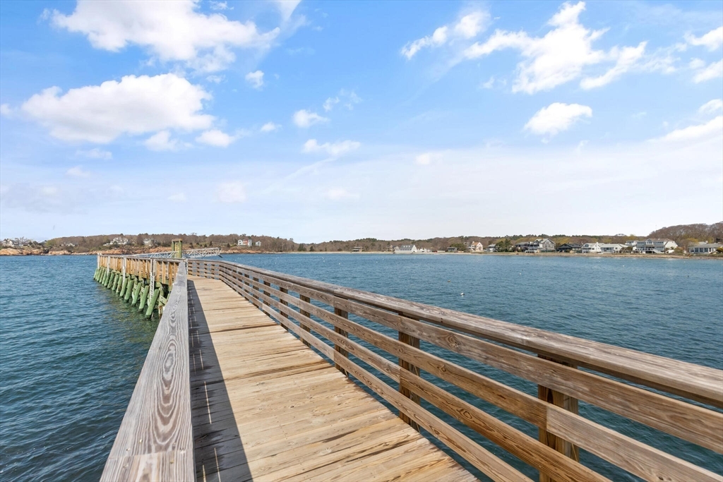 15 Flume Road, Unit 4 Gloucester, MA 01930 - Photo 5 of 41 a view of wooden floor with a lake view