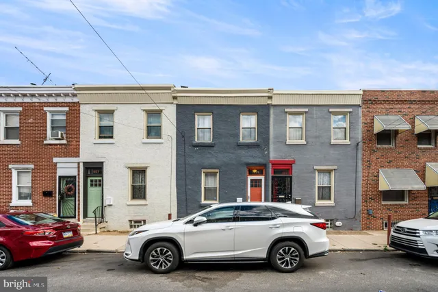 a car parked in front of a building