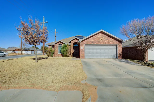 a picture of a house with a yard