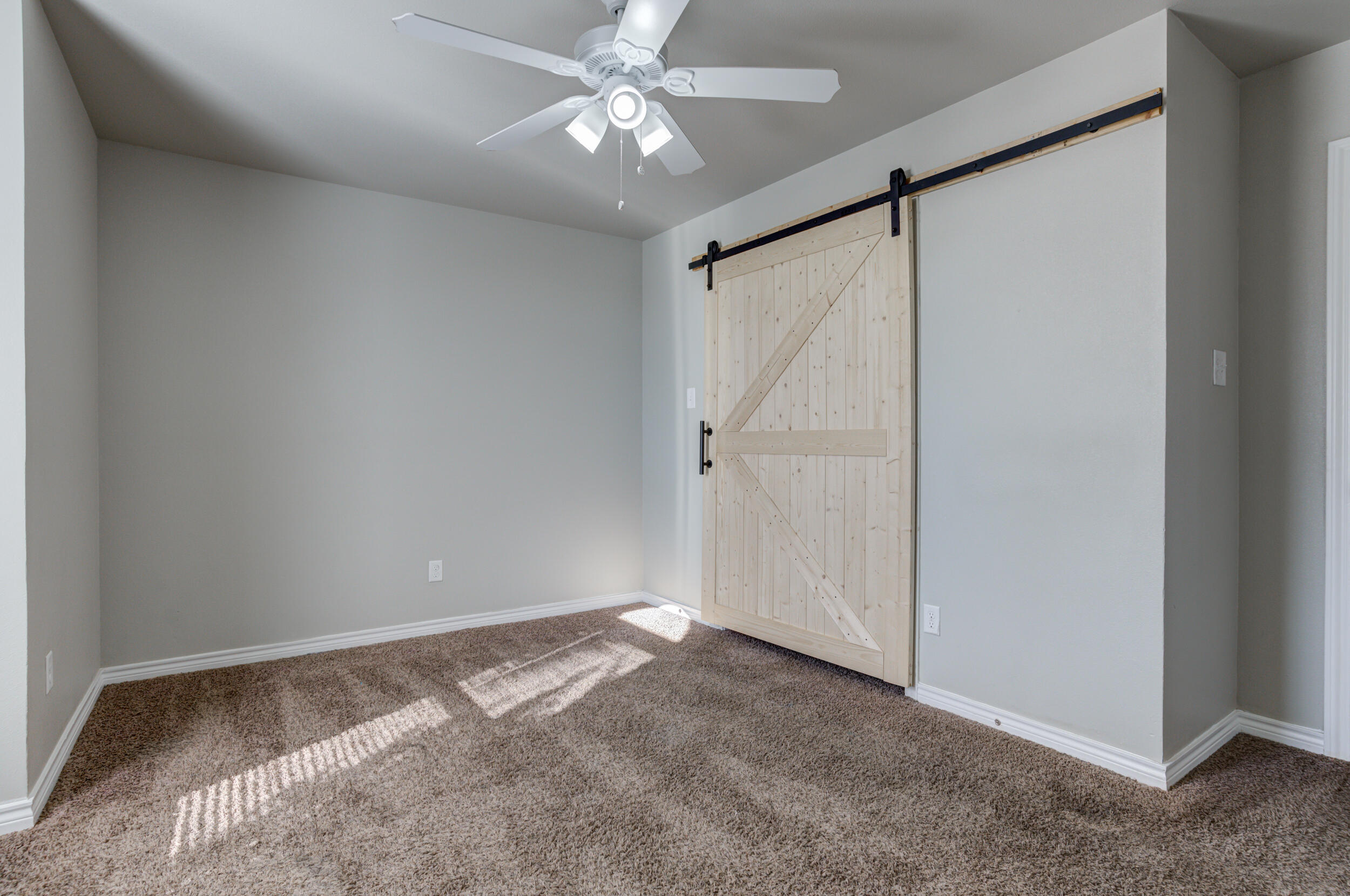 2022 88th Street Lubbock, TX 79423 - Photo 28 of 33 a view of an empty room