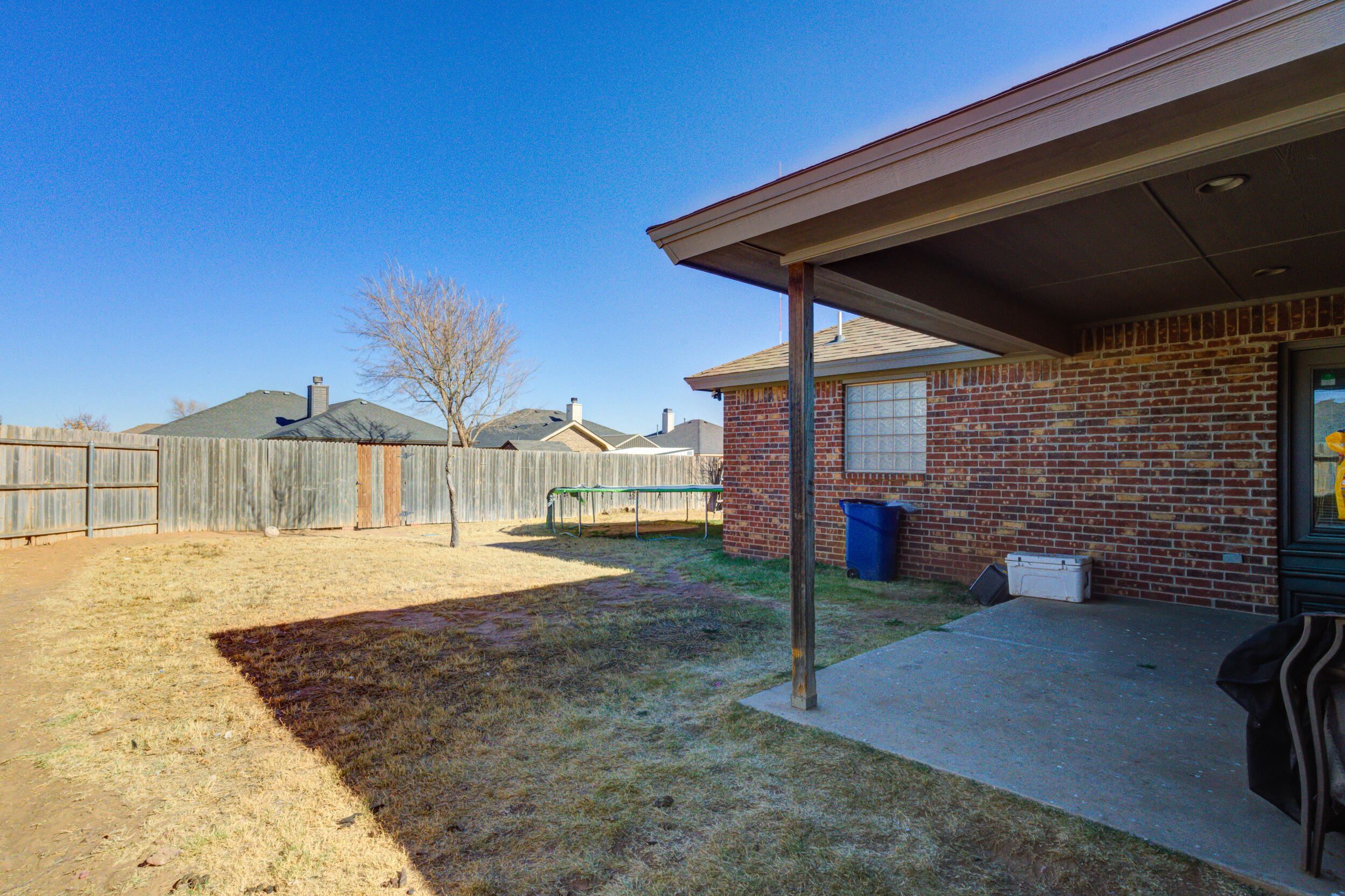 2022 88th Street Lubbock, TX 79423 - Photo 31 of 33 a view of a backyard of the house