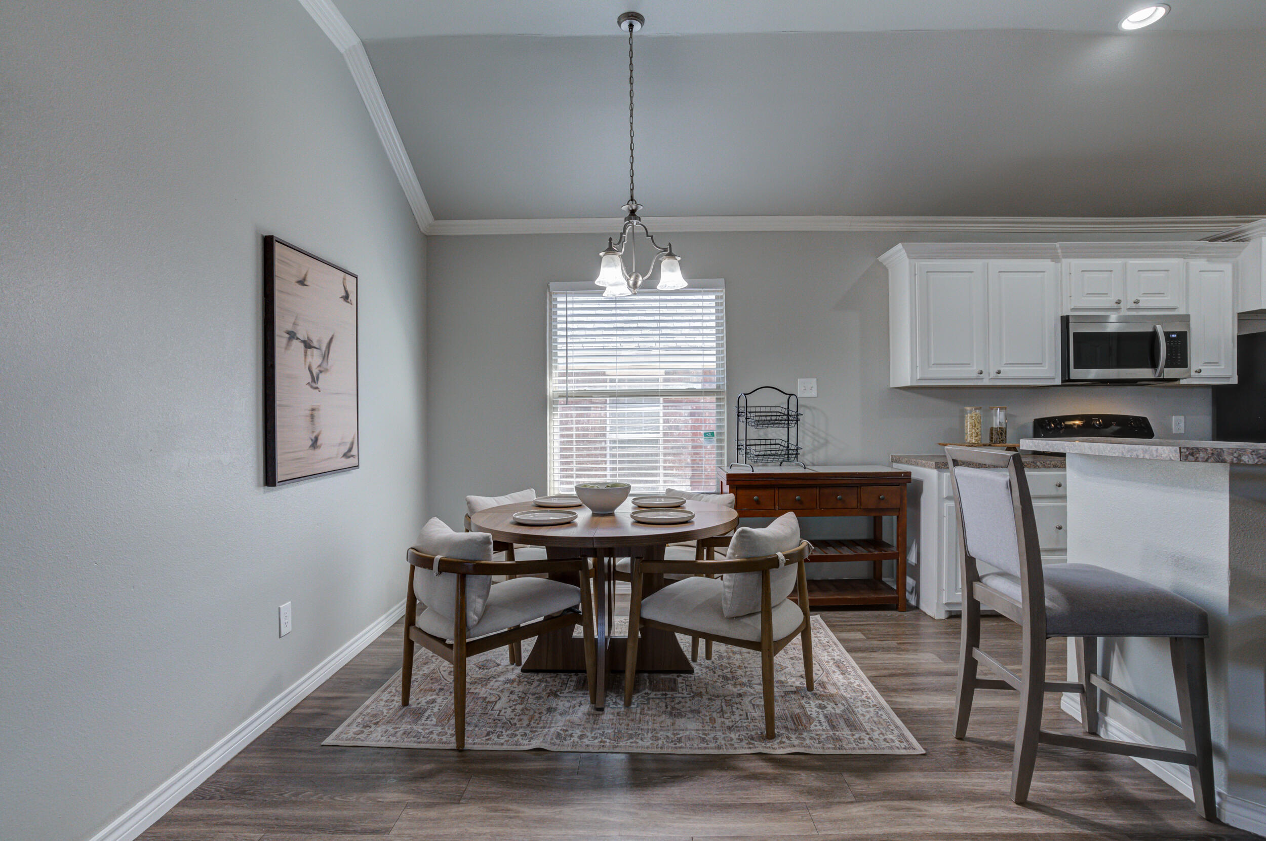 2022 88th Street Lubbock, TX 79423 - Photo 8 of 33 a dining room with furniture and window