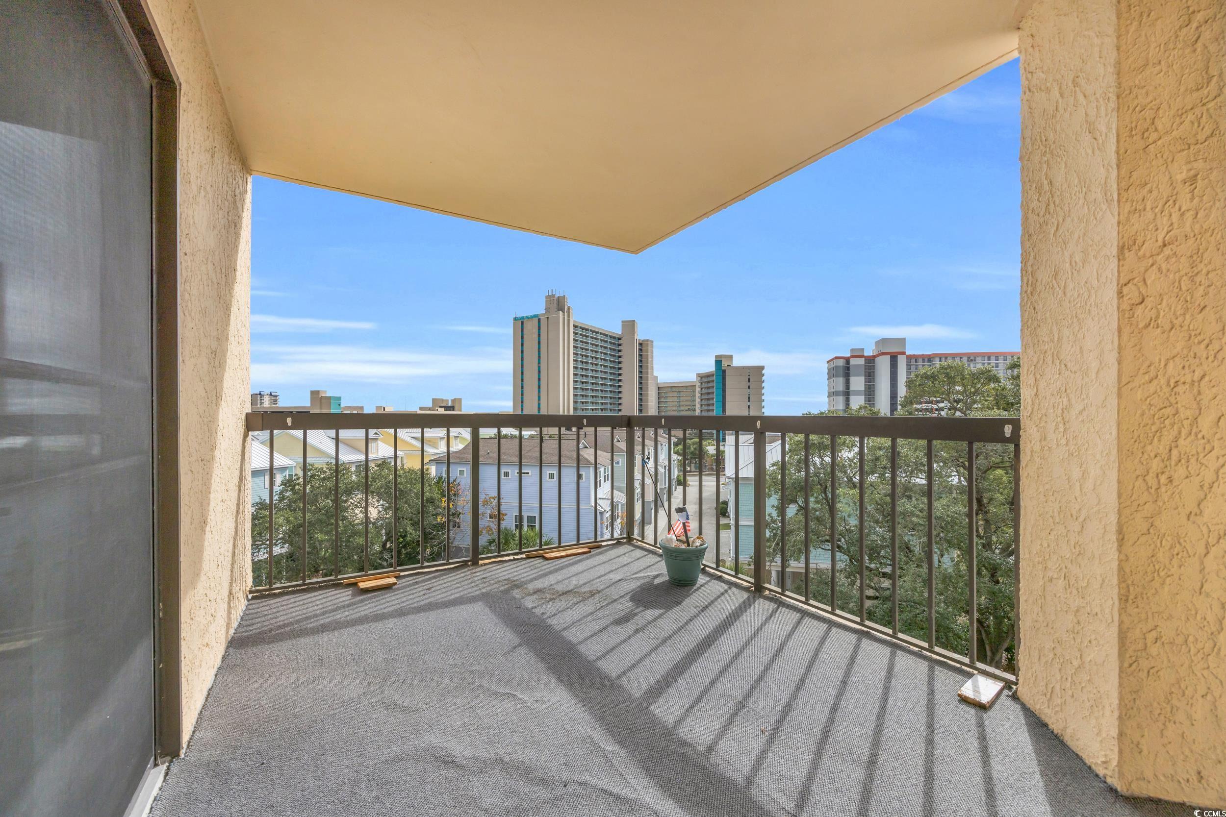 310 73rd Avenue North, Unit 5C Myrtle Beach, SC 29572 - Photo 16 of 20 Balcony featuring a water view