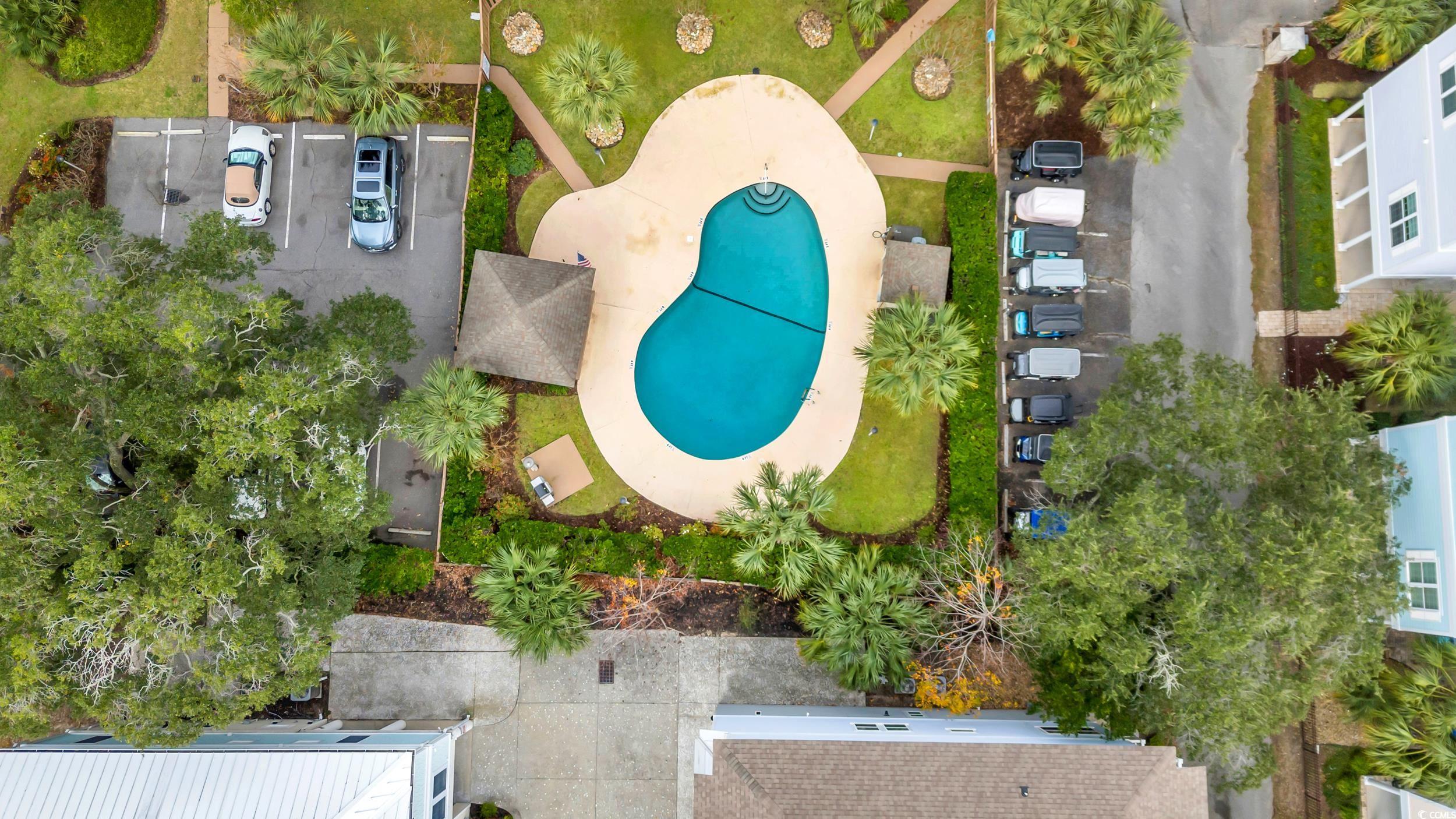 310 73rd Avenue North, Unit 5C Myrtle Beach, SC 29572 - Photo 19 of 20 Aerial view of a pool area