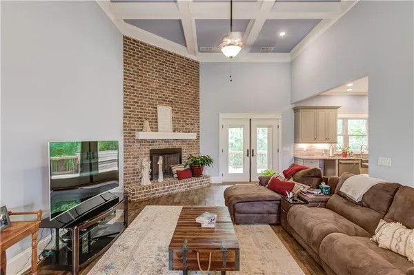 a kitchen with a refrigerator and a stove