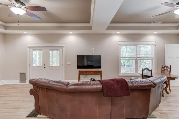 a view of a backyard with large trees