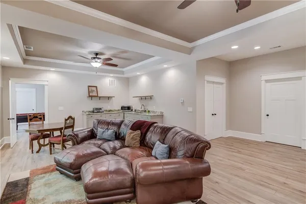 a view of a backyard with plants and a backyard