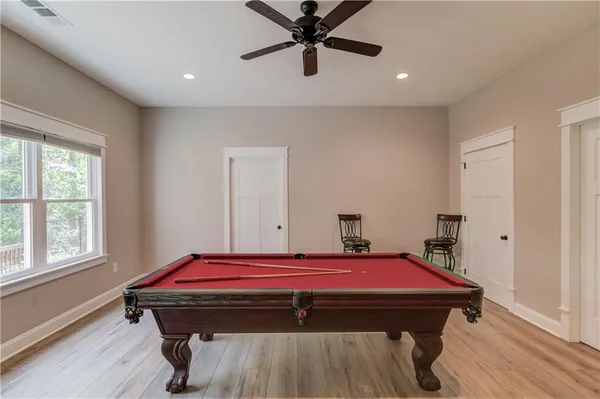 a view of a yard with large trees