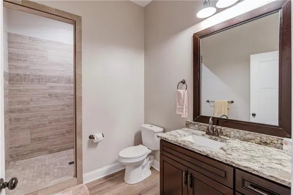 a view of a swimming pool with a yard