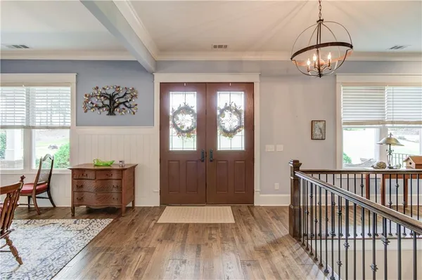 a view of a workspace with furniture and a piano