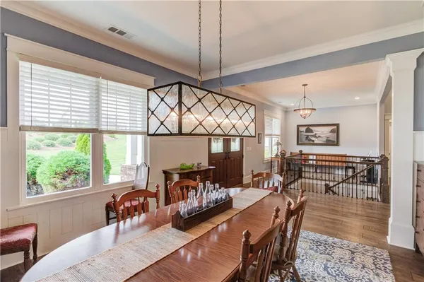 a living room with furniture fireplace and flat screen tv
