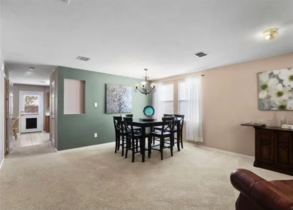 a view of a livingroom and dining room