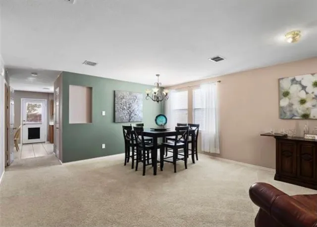 a view of a livingroom and dining room
