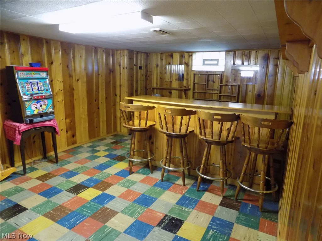 4914 Snow Road Cleveland, OH 44134 - Photo 14 of 25 Lower level recreation room with build in bar. Lots of room for entertaining!