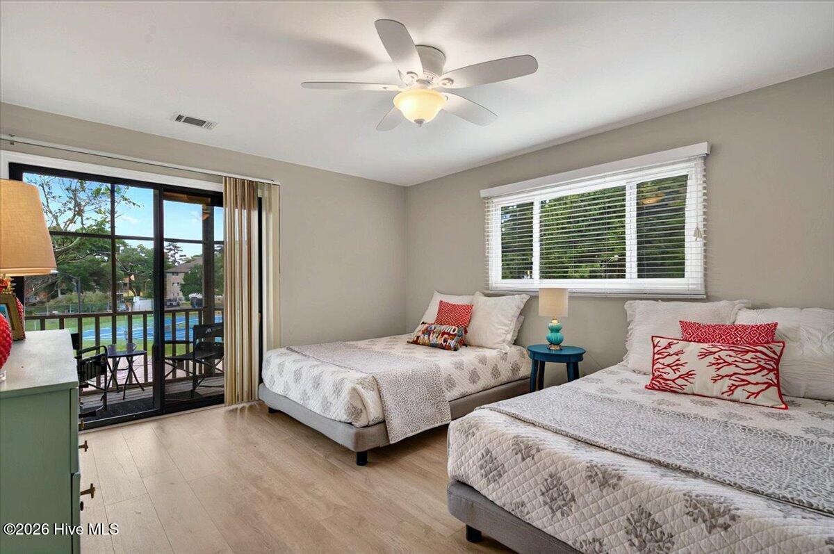 816 Colony Place Southwest, Unit D Sunset Beach, NC 28468 - Photo 28 of 55 Screened Porch entry from lock-out bedroom