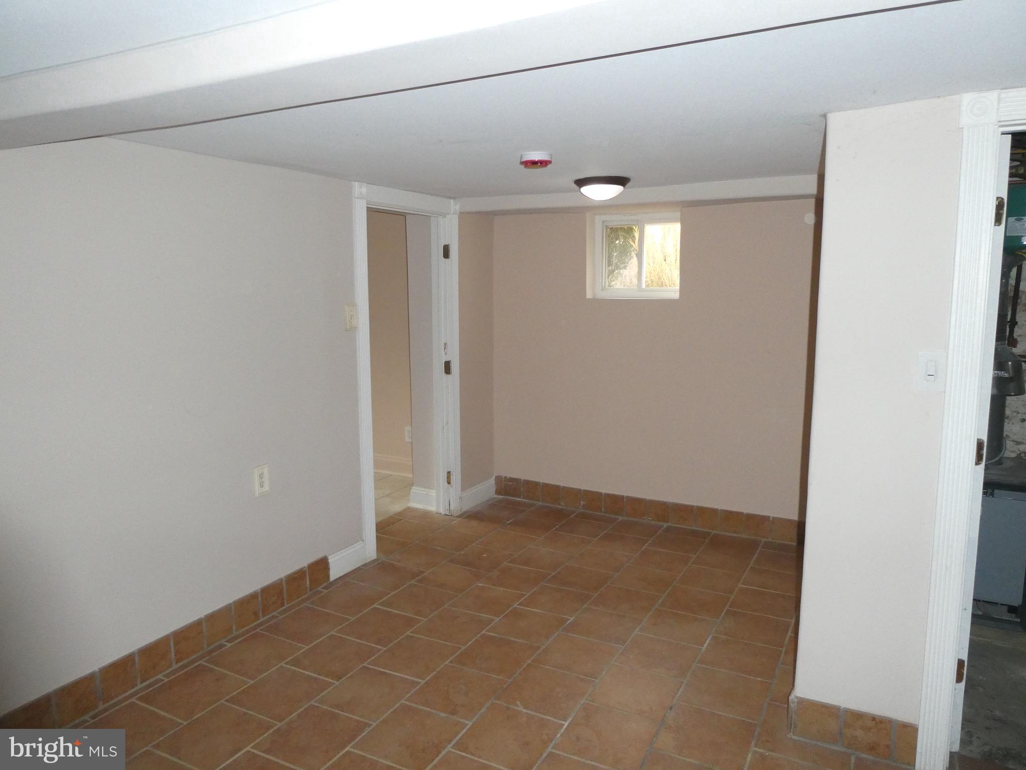 2024 Elm Avenue Atco, NJ 08004 - Photo 17 of 25 a view of an empty room and window