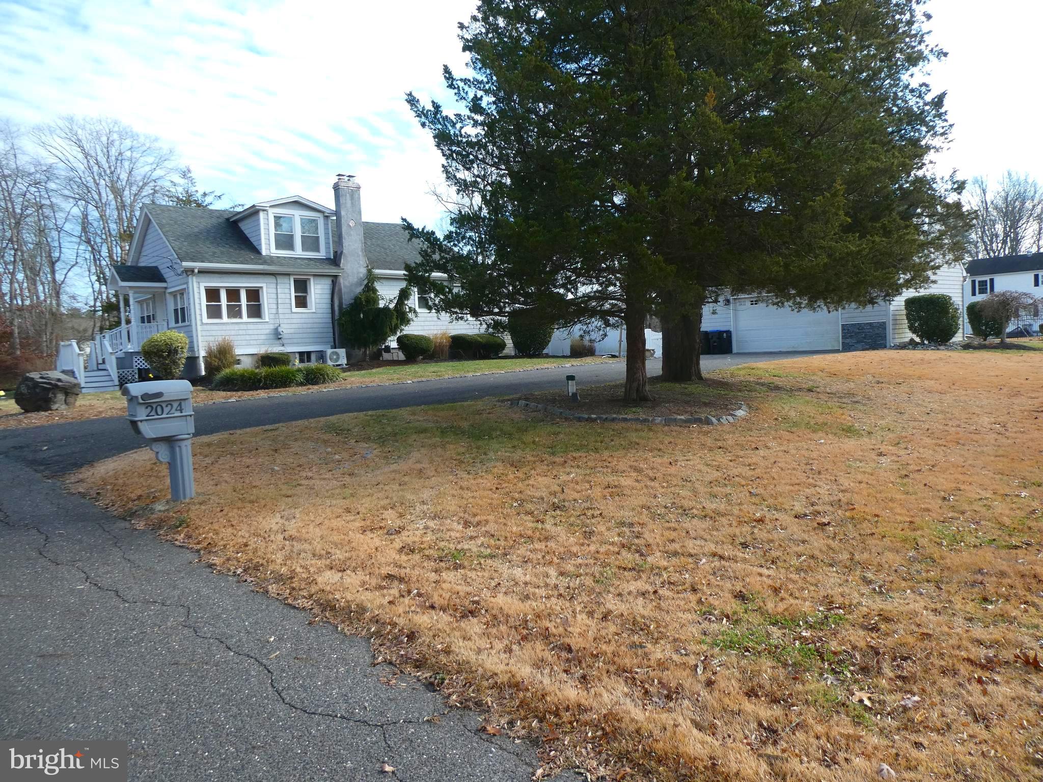 2024 Elm Avenue Atco, NJ 08004 - Photo 19 of 25 a front view of a house with a yard