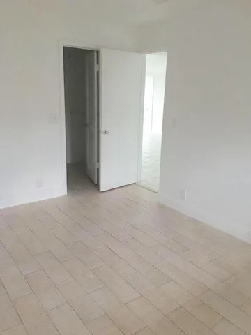 an empty room with an entryway