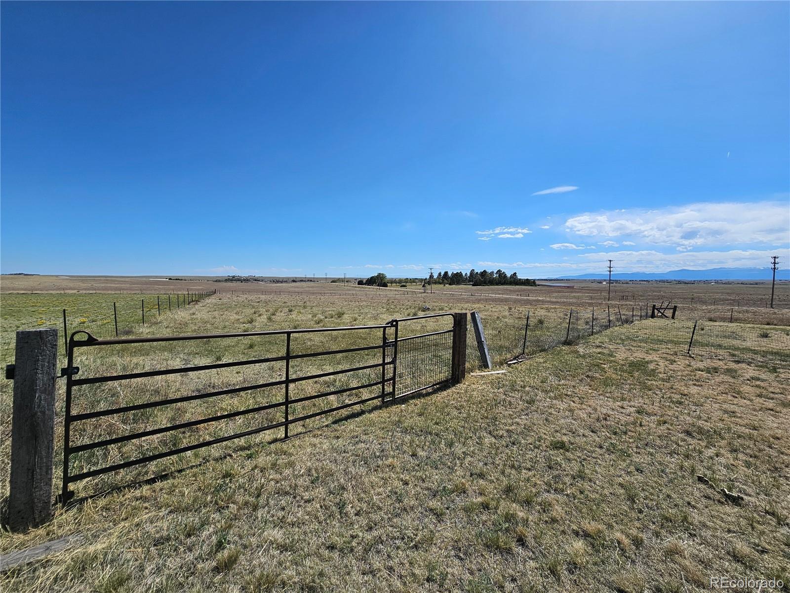 16985 Sage Crest Road Peyton, CO 80831 - Photo 23 of 25 a view of outdoor space and ocean view
