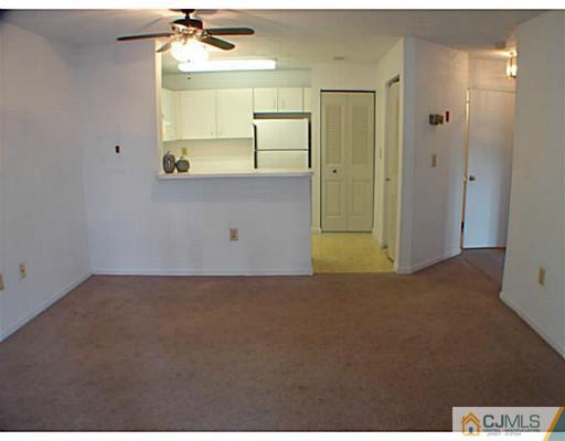 914 Edpas Road New Brunswick, NJ 08901 - Photo 11 of 11 a view of a room with a cabinet and mirror