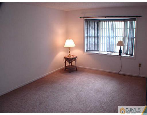 914 Edpas Road New Brunswick, NJ 08901 - Photo 6 of 11 a living room with furniture and a window
