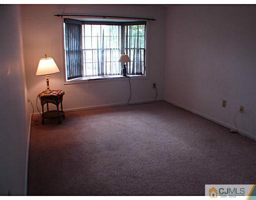 914 Edpas Road New Brunswick, NJ 08901 - Photo 7 of 11 a view of an empty room with a window