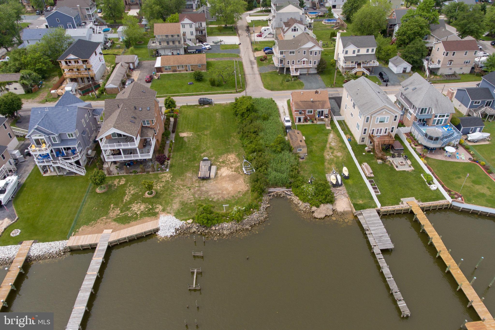 Cuckold Point Road Sparrows Point, MD 21219 - Photo 3 of 25 an aerial view of residential houses with outdoor space
