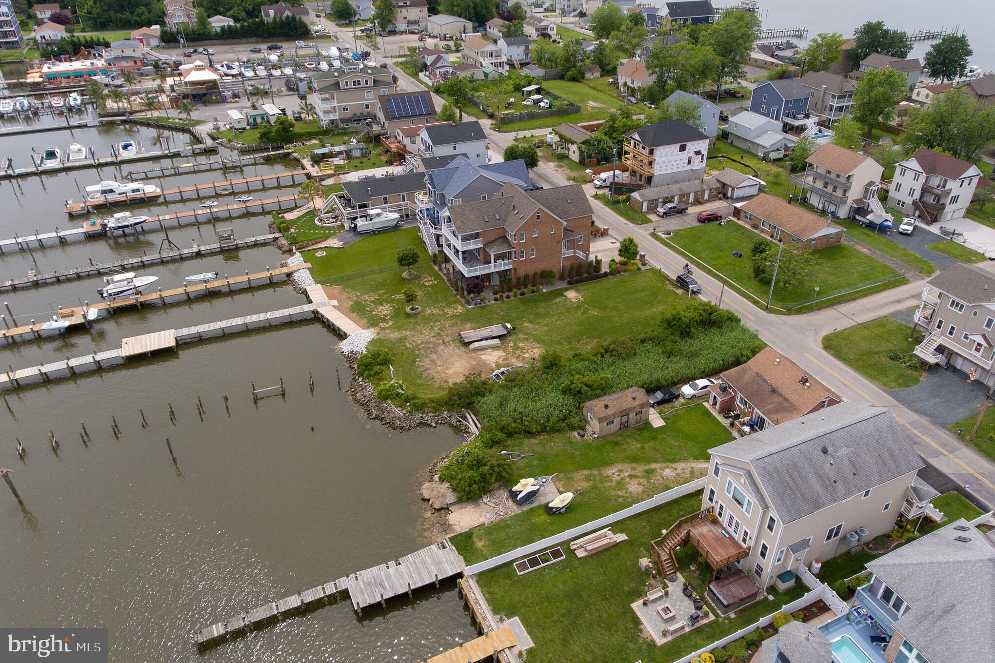 Cuckold Point Road Sparrows Point, MD 21219 - Photo 5 of 25 an aerial view of residential houses with outdoor space
