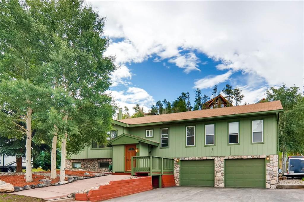 738 Deer Path Road Dillon, CO 80435 - Photo 1 of 25 a front view of a house with a yard