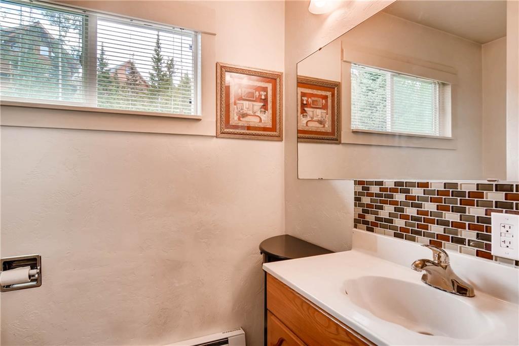 738 Deer Path Road Dillon, CO 80435 - Photo 13 of 25 a bathroom with a sink and a window