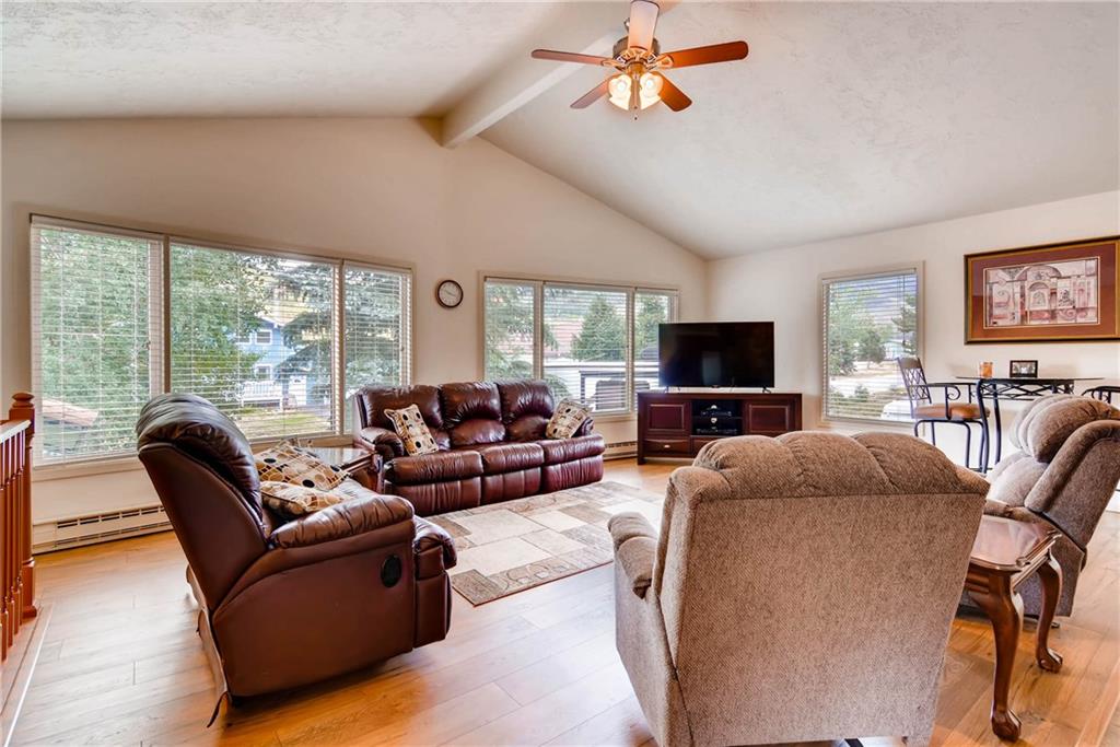 738 Deer Path Road Dillon, CO 80435 - Photo 5 of 25 a living room with furniture and a flat screen tv