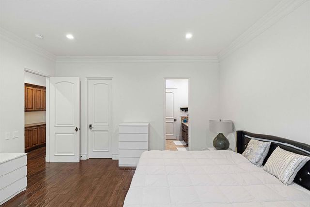 a bathroom with a sink toilet vanity and mirror