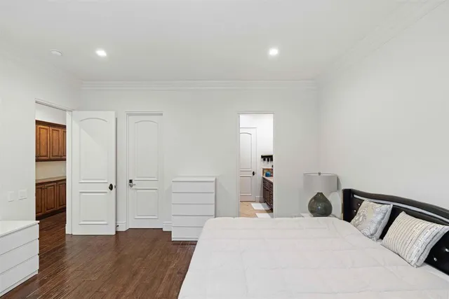 a bathroom with a sink toilet vanity and mirror