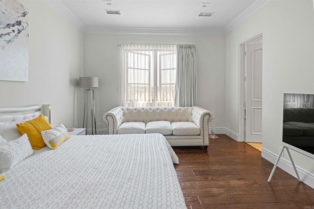 a view of a patio with a dining table and chairs with fire pit