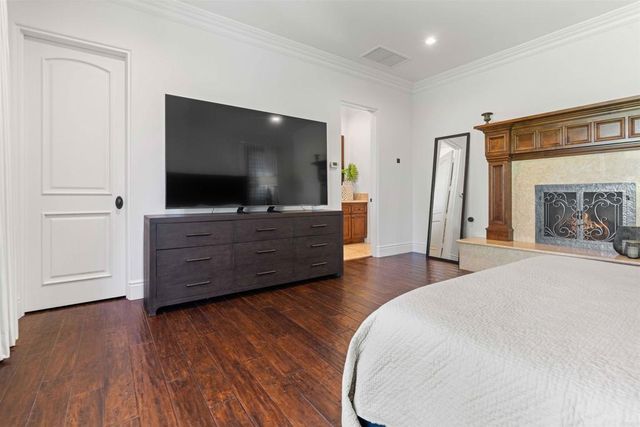 a view of a house with a yard and swimming pool