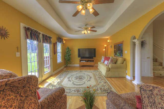50 Greenvale Road Milton, TN 37118 - Photo 4 of 20 a spacious bedroom with a large bed and a chandelier