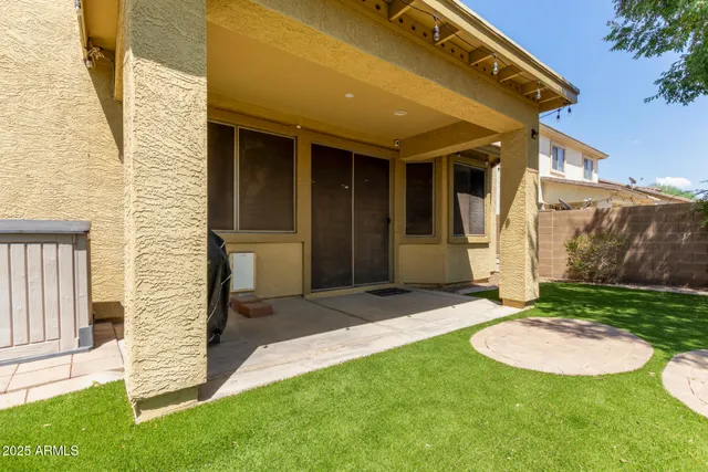 a view of a back yard of the house