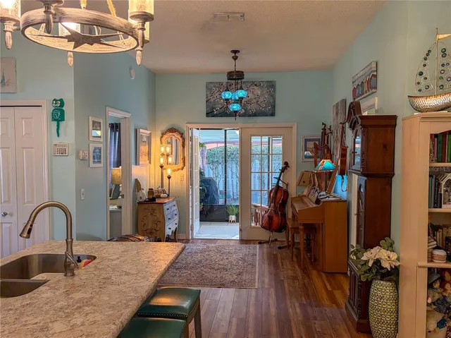 a view of a kitchen filled with furniture and kitchen view