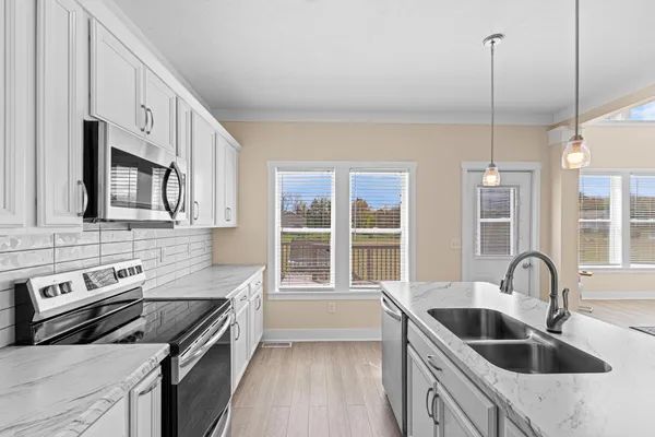 $474,900 | 8534 East Barber Ridge Drive, Alto, MI 49302