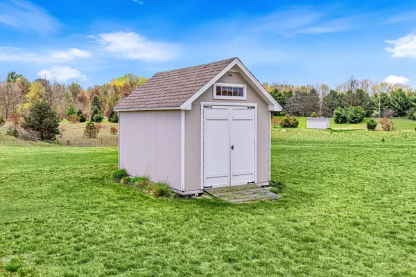 $474,900 | 8534 East Barber Ridge Drive, Alto, MI 49302