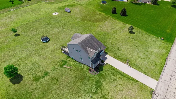 $474,900 | 8534 East Barber Ridge Drive, Alto, MI 49302