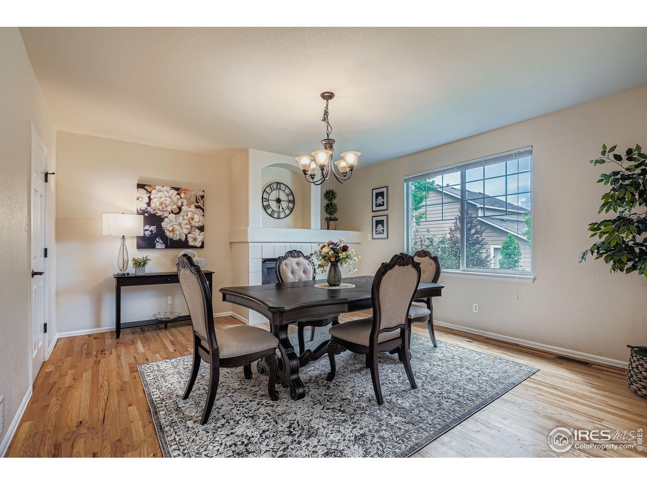 6178 Graden Street Frederick, CO 80530 - Photo 14 of 28 a dining room with furniture and window