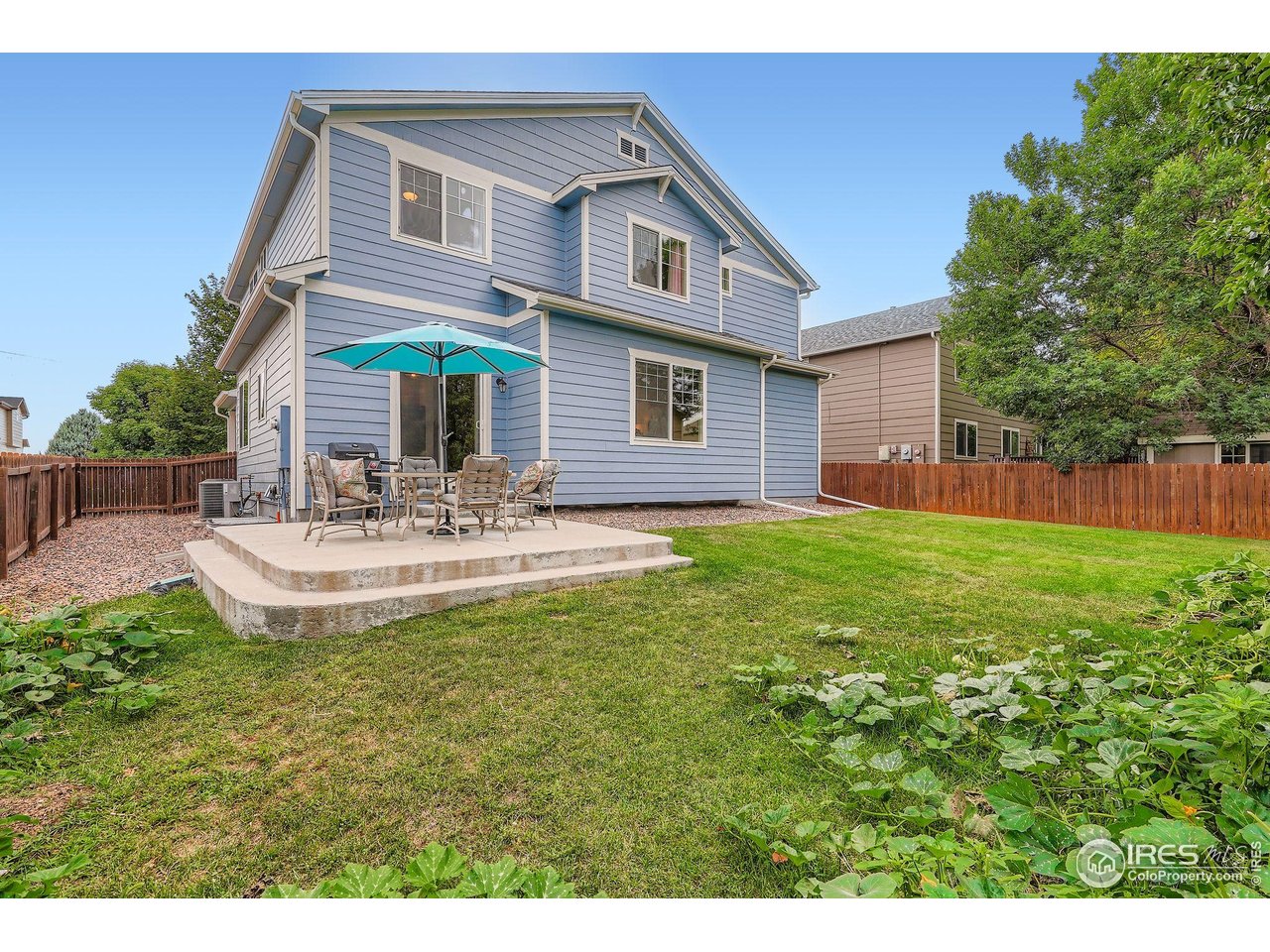 6178 Graden Street Frederick, CO 80530 - Photo 27 of 28 a view of a house with a swimming pool