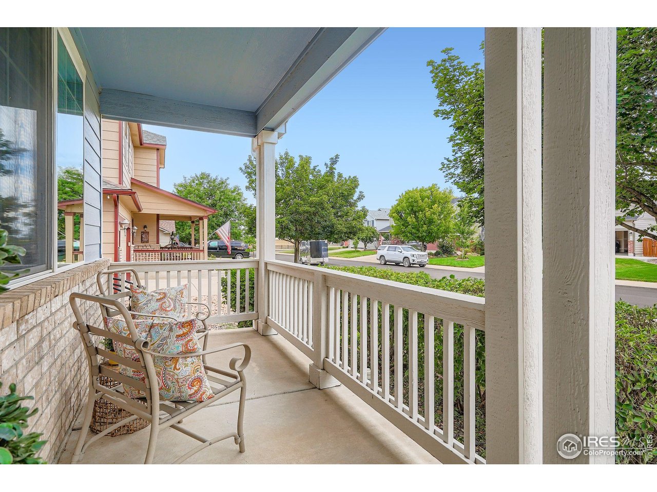 6178 Graden Street Frederick, CO 80530 - Photo 4 of 28 a view of a chairs and table in patio next to a yard