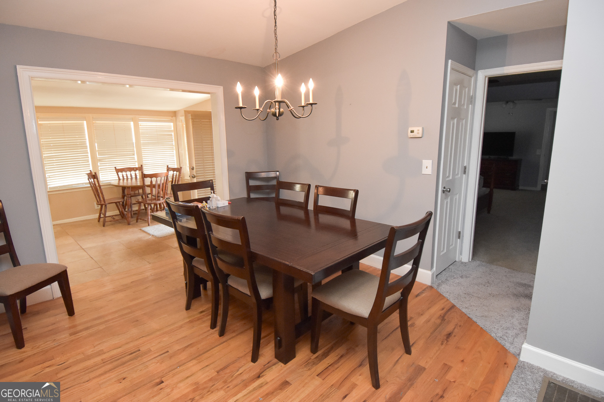 1256 Vaughn Road Griffin, GA 30223 - Photo 11 of 73 a view of a dining room with furniture window and wooden floor