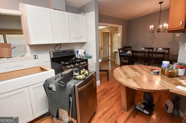 a bathroom with a toilet a sink and a shower