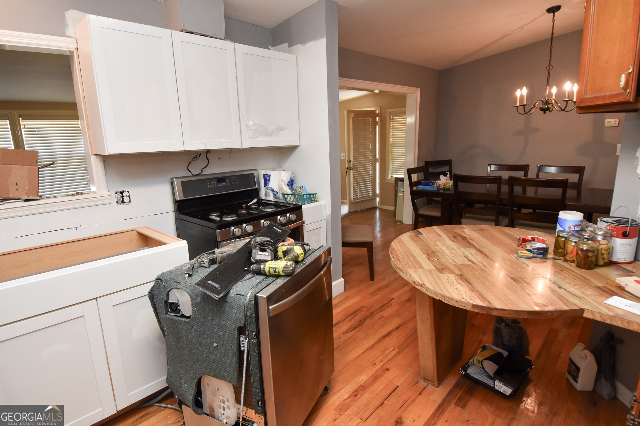 1256 Vaughn Road Griffin, GA 30223 - Photo 16 of 73 a kitchen with a sink appliances and cabinets