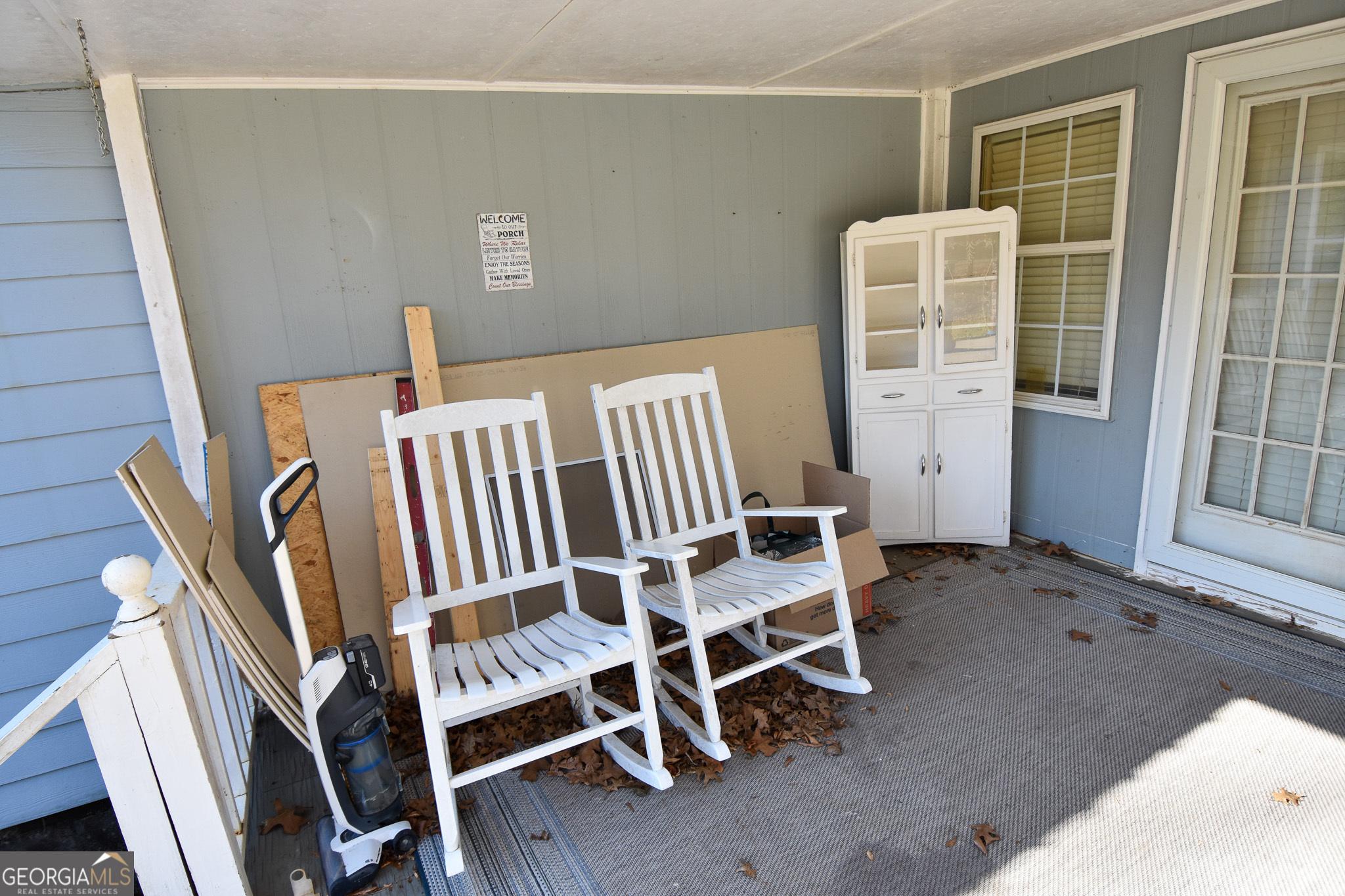 1256 Vaughn Road Griffin, GA 30223 - Photo 46 of 73 a view of an empty room with wooden floor and windows
