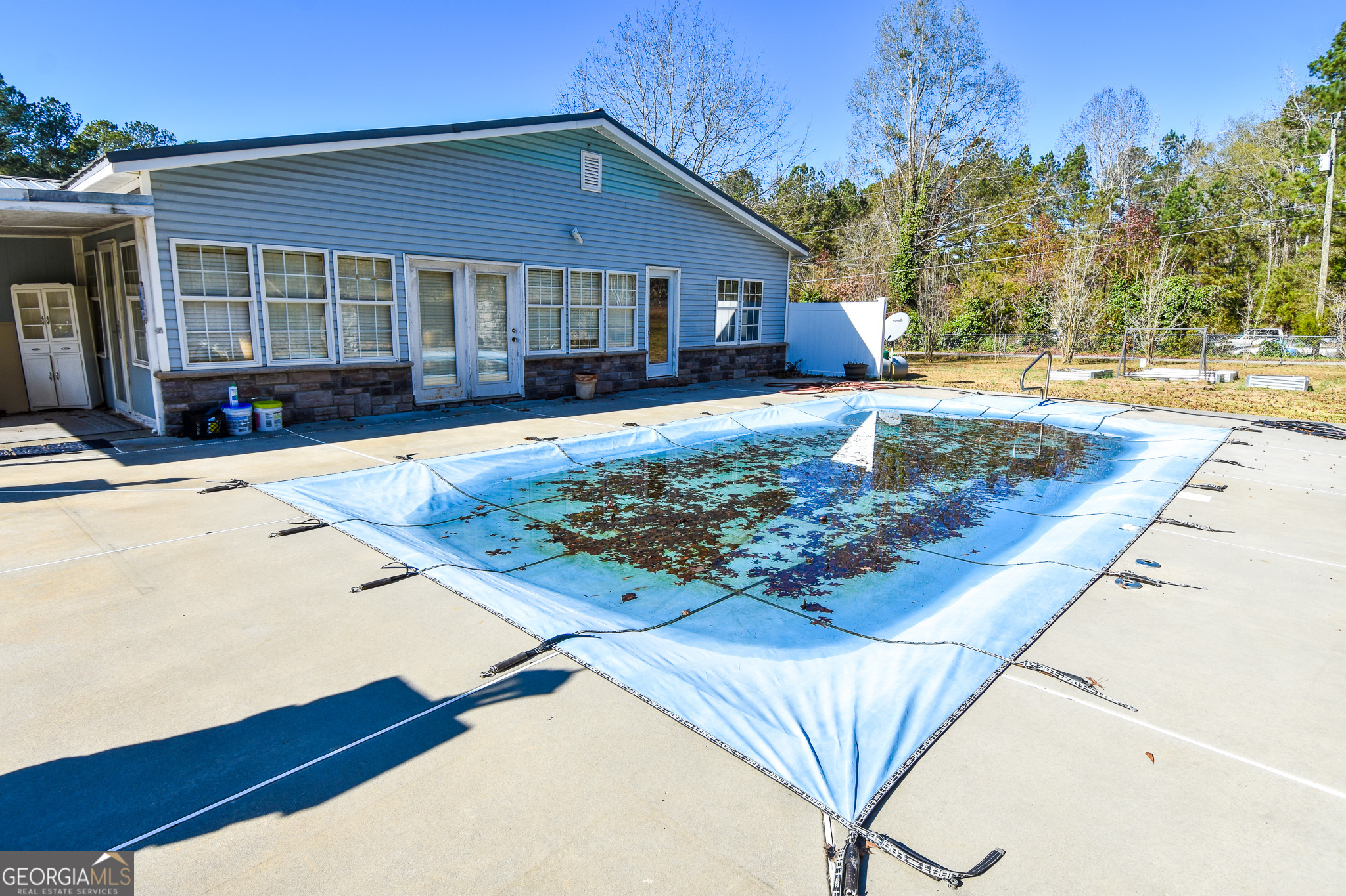 1256 Vaughn Road Griffin, GA 30223 - Photo 48 of 73 a front view of a house with garden